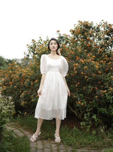 Organza midi dress with puff sleeves and layered sheer skirt